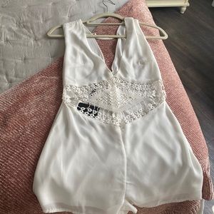 White cut out romper - tags on it